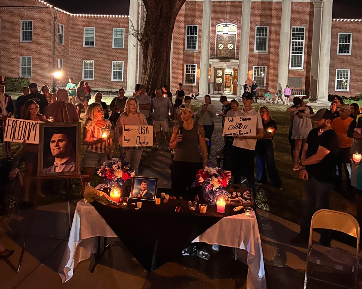 People gather to mourn in front of the Hernando court house.