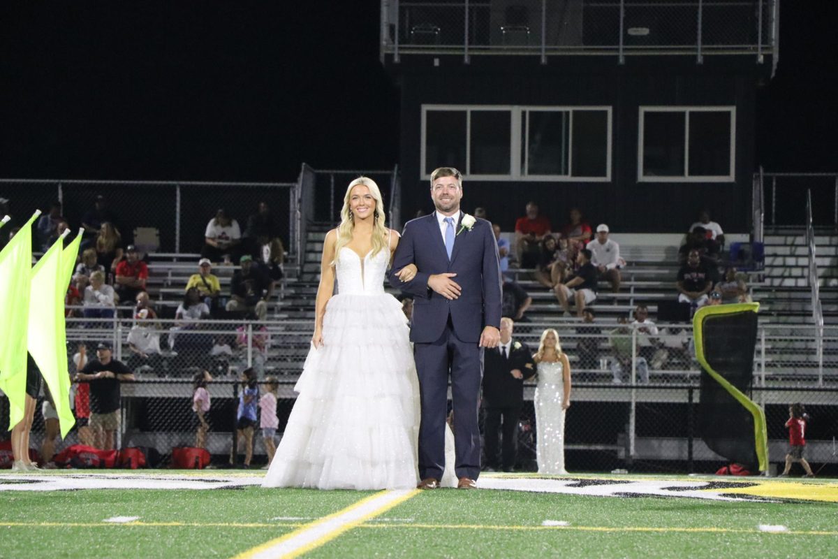 Picture of Libber Foster and, 2025 Hernando High School Homecoming Queen accompanied by her father